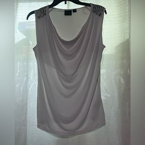 Classic white tank top with design on shoulders